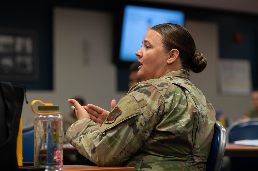 Tech. Sgt. Amber Swearengin, Congressional travel branch office of the Secretary of the Air Force legislative liaison, NCO in charge shares her experiences as NCO during a Senior NCO professional enhancement seminar, Aug. 11, 2022, at Joint Base Anacostia-Bolling, Washington D.C. The seminar provided Airmen and Guardians an opportunity to network as they enter critical roleS in leading teams and shaping the future force. (U.S. Air Force photo by Staff Sgt. Nilsa Garcia)