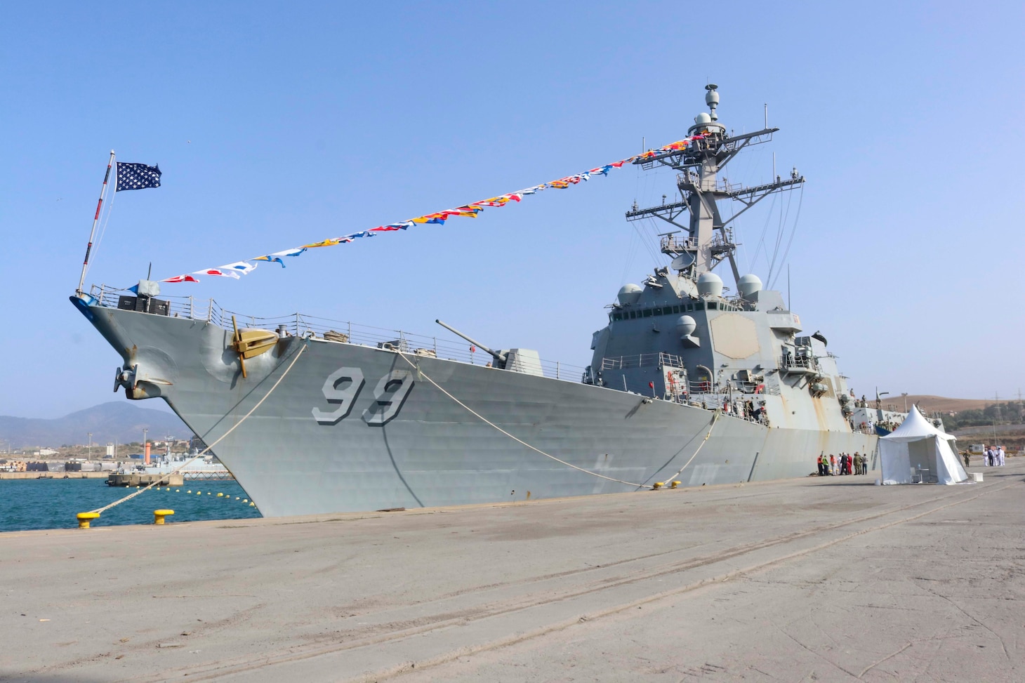 The Arleigh Burke-class guided-missile destroyer USS Farragut (DDG  99) moored in the port of Djen Djen in Jijel, Algeria for a scheduled port visit, Sept. 18, 2022.