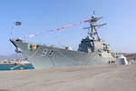 The Arleigh Burke-class guided-missile destroyer USS Farragut (DDG  99) moored in the port of Djen Djen in Jijel, Algeria for a scheduled port visit, Sept. 18, 2022.