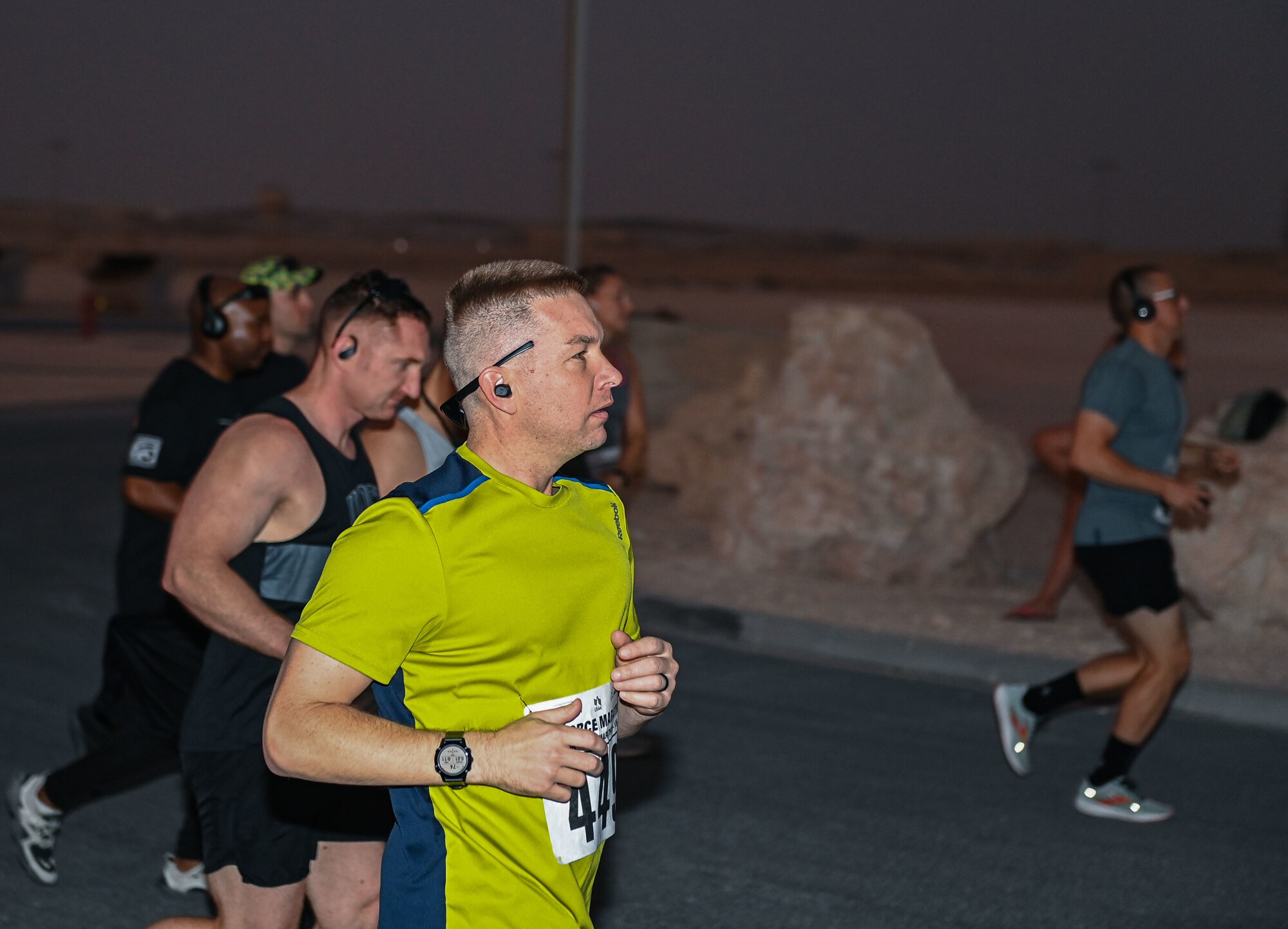 U.S. Air Force Capt. Andrew Monroe, 379th Air Expeditionary Wing Executive Officer, takes part in a morale run Sept. 17, 2022 at Al Udeid Air Base, Qatar. The run commemorated the creation of the U.S. Air Force from the Army Air Corps 75 years ago.  (U.S. Air National Guard photo by Master Sgt. Michael J. Kelly)