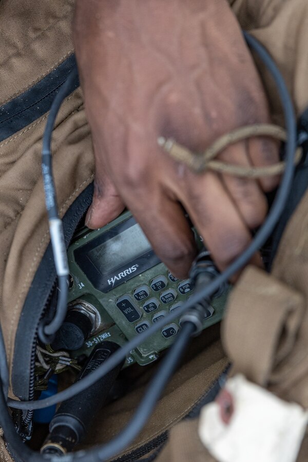 U.S. Marines with Headquarters Company, 3rd Battalion, 25th Marine Regiment, 4th Marine Division, in support of Special Purpose Marine Air-Ground Task Force UNITAS LXIII establish radio communication during an amphibious assault training event during exercise UNITAS LXIII in Itaoca, Brazil, Sept. 16, 2022. A landing craft, utility was used to move Brazilian, United States, and Uruguayan marines to shore from the amphibious transport dock ship USS Mesa Verde (LPD 19), where they secured a beachhead. UNITAS is the world’s longest-running annual multinational maritime exercise that brings together forces from 19 countries to include Brazil, Cameroon, Chile, Colombia, Dominican Republic, Ecuador, France, Guyana, Jamaica, Mexico, Namibia, Panama, Paraguay, Peru, South Korea, Spain, the United Kingdom, the United States of America, and Uruguay. The exercise focuses on enhancing interoperability among multiple nations and joint forces during littoral and amphibious operations in order to build on existing regional partnerships and create new enduring relationships that promote peace, stability, and prosperity in the U.S. Southern Command’s area of responsibility. (U.S. Marine Corps photo by Lance Cpl. David Intriago)