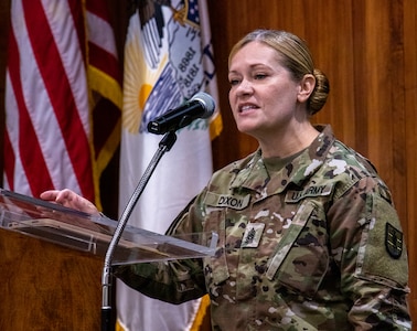 Illinois Army National Guard Command Sgt. Maj. Mary Dixon, of Chapin, Illinois, speaks to those in attendance during a retirement ceremony Sept. 18 at the Illinois Military Academy on Camp Lincoln, Springfield, Illinois. Dixon will retire Sept. 30 after more than 28 years of service in the Illinois Army National Guard