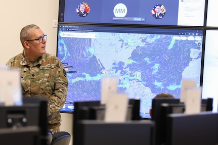 A member of the Puerto Rico National Guard monitors the path of Hurricane Fiona, which caused heavy flooding and knocked out power to the entire island Sept 17-18, 2022. The Guard prepositioned personnel and heavy equipment in nine locations before the storm passed over southwest Puerto Rico.