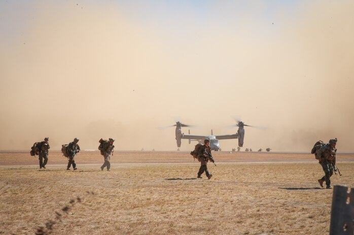 U.S. Marines with India Co., 3rd Battalion, 7th Marine Regiment, Ground Combat Element, Marine Rotational Force-Darwin 22, arrive at South Goulburn Island, Australia via U.S. Marine Corps MV-22 Ospreys with Marine Medium Tiltrotor Squadron 268 reinforced, Aviation Combat Element, MRF-D 22, Aug. 31, 2022. The Expeditionary Advanced Base Operations exercise was a force-on-force training that exercised the MRF-D’s ability to forward deploy and establish expeditionary advanced bases.
