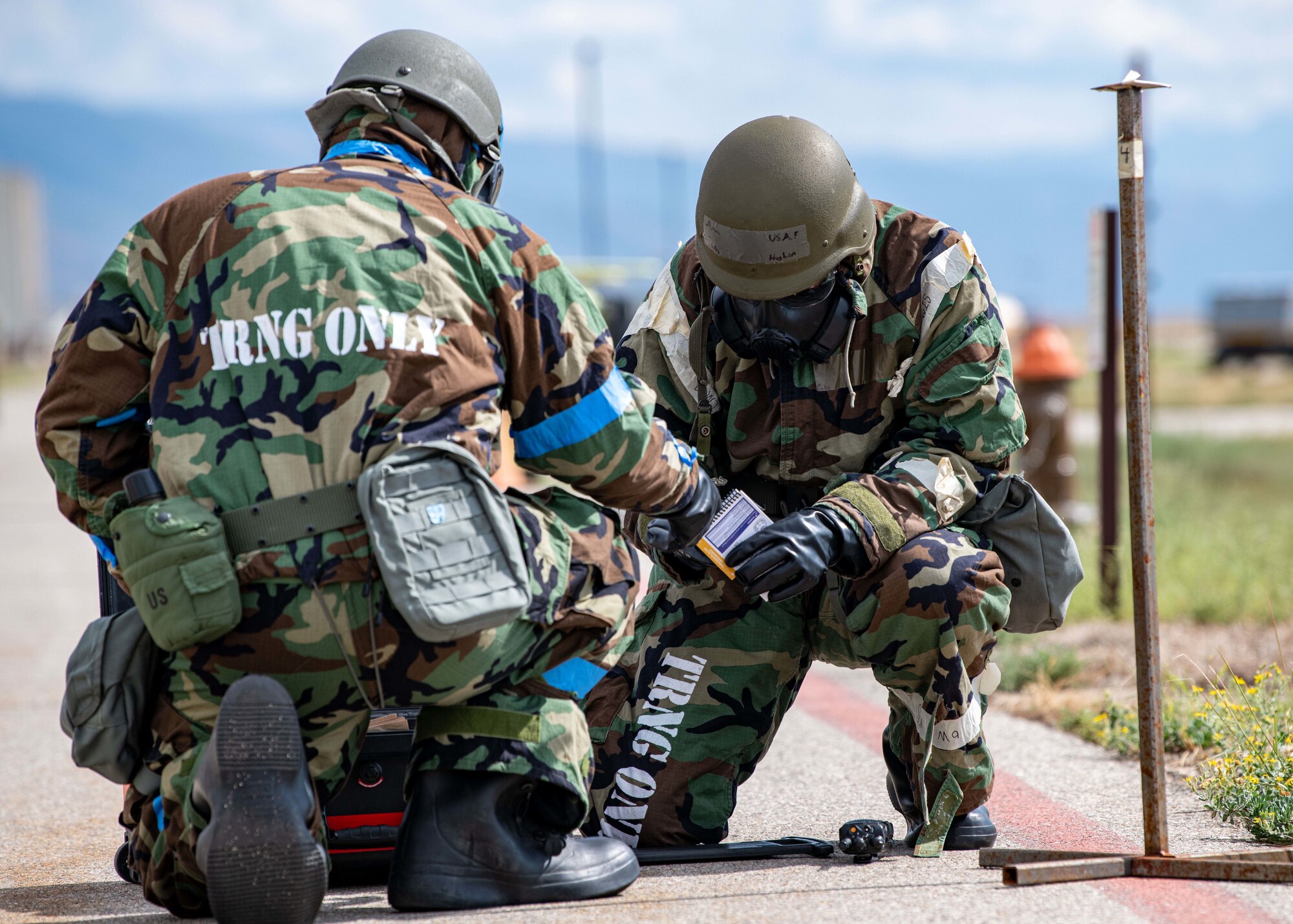 Airmen from the 421st Fighter Generation Squadron conduct post-attack reconnaissance sweeps during a Phase II readiness exercise, September 15th, 2022, held on Hill Air Force Base, Utah.  The exercise consisted of self-aid buddy care, chemical attacks, and tested their ability to survive and operate in a simulated deployed scenario. (U.S. Air Force photo by Staff Sgt. Codie Trimble)