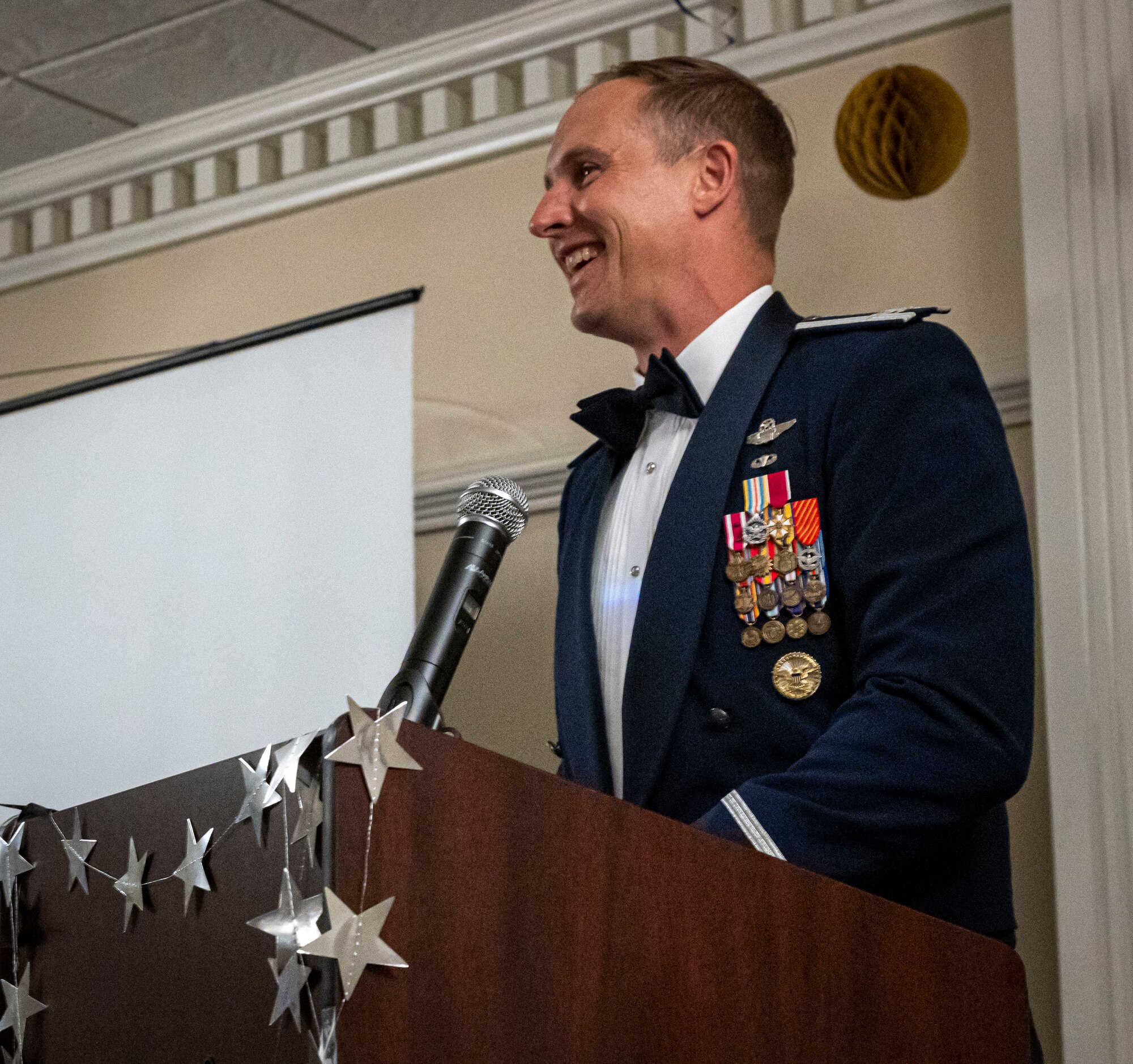 Col. Lucas Teel, 4th Fighter Wing commander, speaks about the Air Force heritage during the annual Air Force ball at Seymour Johnson Air Force Base, North Carolina, September 17, 2022. The ceremony fostered esprit de corps and pride among Airmen through a shared history of exceptional service. (U.S. Air Force photo by Airman 1st Class Sabrina Fuller)