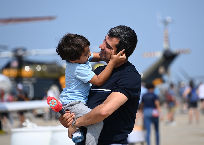 Attendees of the Joint Base Andrews 2022 Air & Space Expo share a moment together at JBA, Md., Sept. 17, 2022.