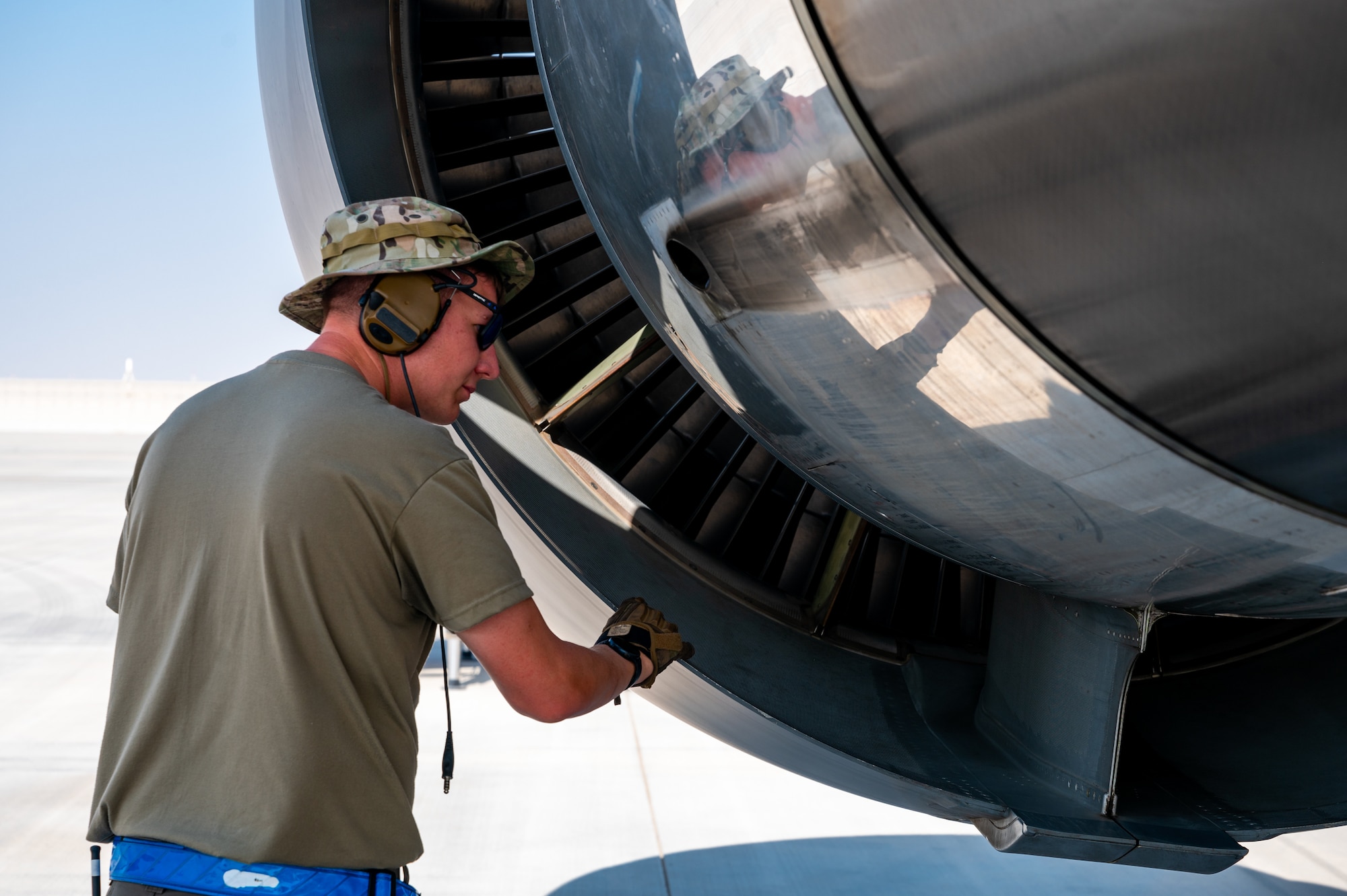 U.S. Air Force Staff Sgt. Austin Sabolic, 22nd Maintenance Squadron crew chief, inspects a KC-46A Pegasus engine Aug. 30, 2022, at Al Udeid Air Base, Qatar. After an aircraft lands, maintenance personnel perform inspections on various parts of the aircraft to ensure there is no damage from the flight. Airmen and KC-46 Pegasuses from McConnell Air Force Base, Kansas, are conducting Air Mobility Command’s Employment Concept Exercise 22-08 to evaluate the aircraft under stressed conditions. (U.S. Air Force photo by Airman 1st Class Brenden Beezley)