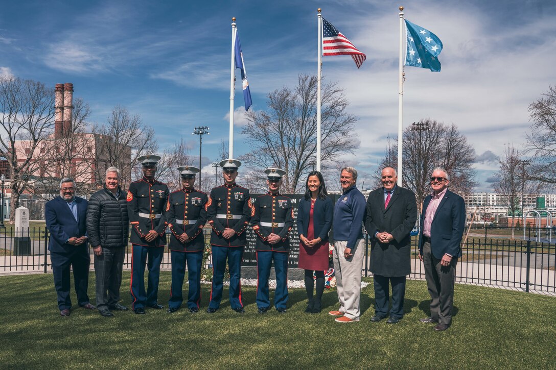 U.S. Marines with Recruiting Station Boston pose for a photo with Mayor Michelle Wu, the mayor of Boston, and other city officials during the South Boston Medal of Honor Ceremony in Boston, Mar. 25, 2022. After the ceremony held at the Medal of Honor Park, the Marines were privileged to meet Mayor Wu. (Courtesy Photo)