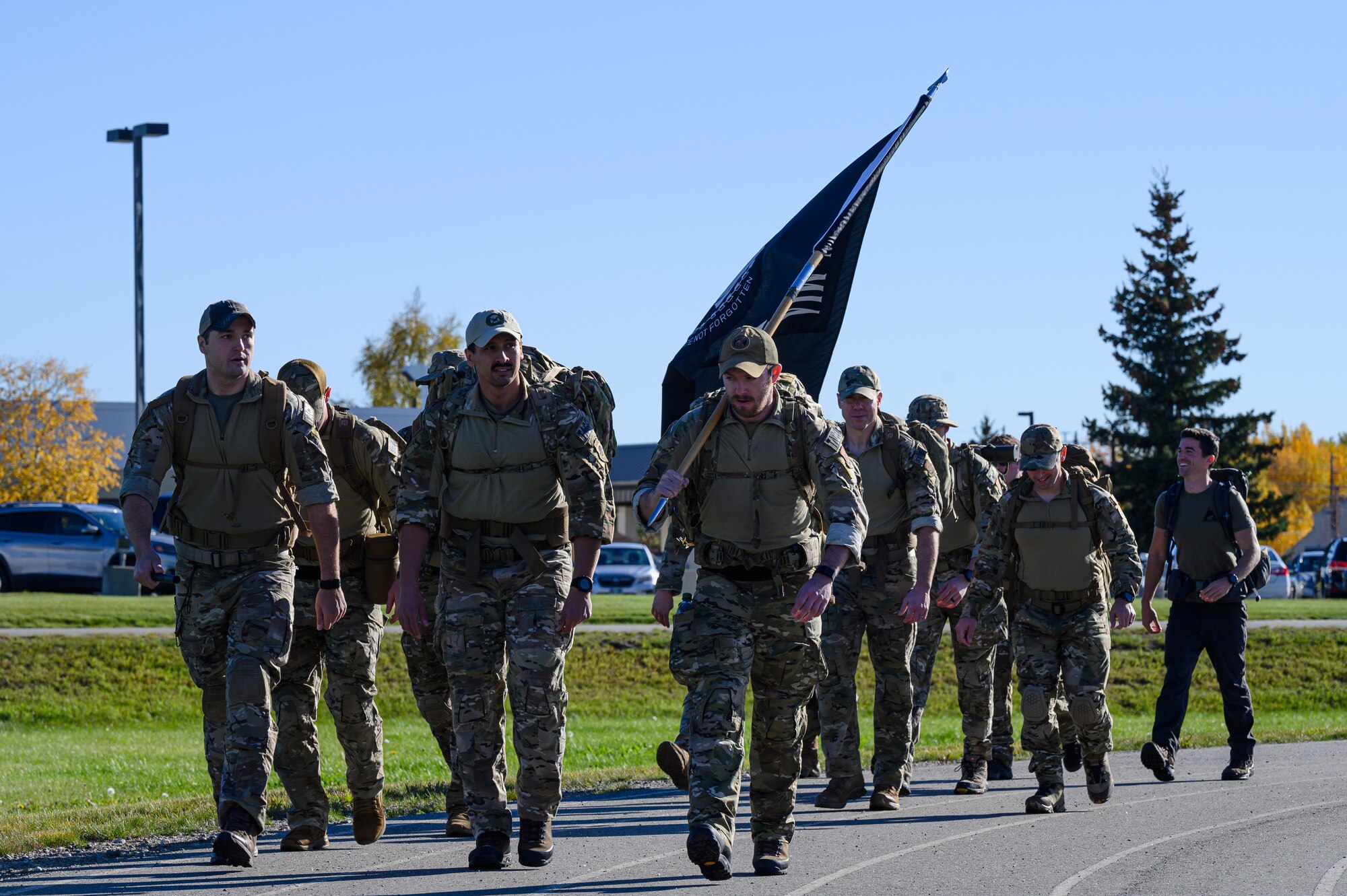 U.S. Airmen assigned to the 3rd Air Support Operations Squadron participate in the Prisoners of War/Missing in Action remembrance run on Eielson Air Force Base, Alaska, Sept. 16, 2022.