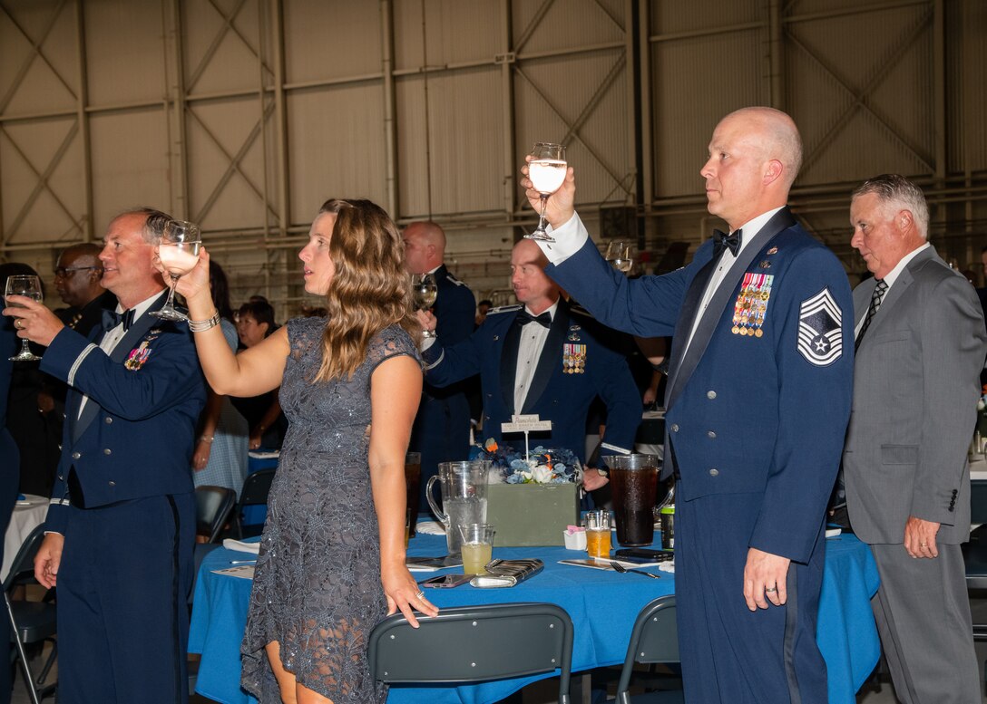 Team Edwards members raise a glass in a ceremonial toast during the 2022 Department of the Air Force Ball at Edwards Air Force Base, California, Sept. 16. (Air Force photo by Giancarlo Casem)