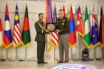 USARPAC Commanding General Charles A. Flynn and Bangladesh Chief of Army Gen. SM Shafiuddin Ahmed present a ceremonial plaque at the conclusion of the 2022 IPAMS conference. (Photo Credit: U.S. Army photo by Spc. Darbi Colson)