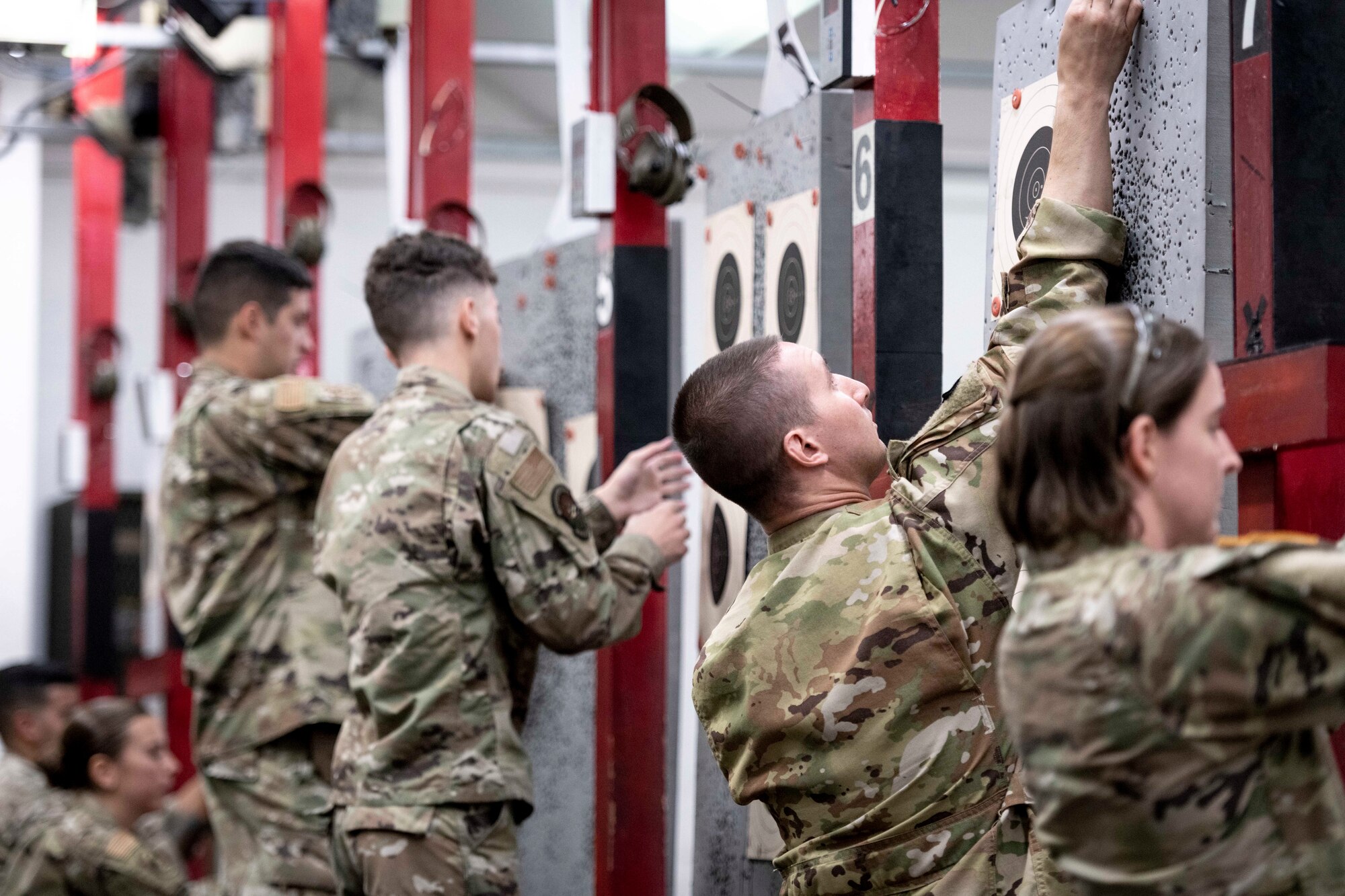 Participants in the Excellence in Competition set up their targets at Yokota Air Base, Japan, Sept. 15, 2022.