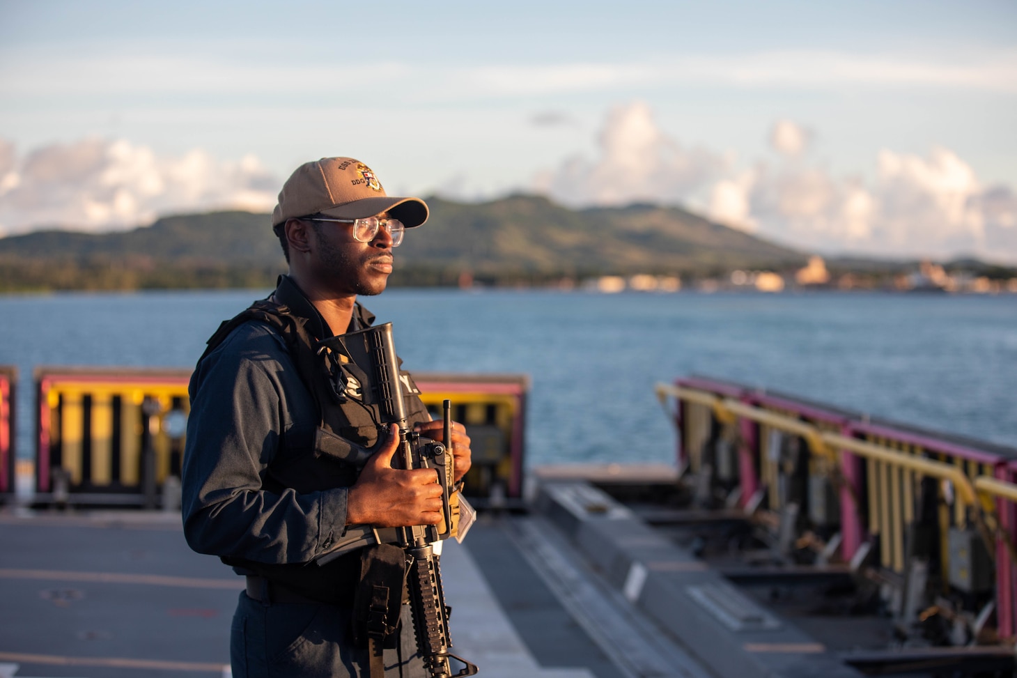 NAVAL BASE GUAM (Sept. 9, 2022) – Logistics Specialist 2nd Class Noah Brown, from Houston, stands watch as topside rover in preparation to get underway aboard guided-missile destroyer USS Zumwalt (DDG 1000) on Naval Base Guam, Sept. 9. Zumwalt is conducting underway operations in support of a free and open Indo-Pacific. (U.S. Navy photo by Mass Communication Specialist 2nd Class Jaimar Carson Bondurant)