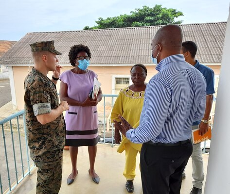 Maj. Ryan Holland, U.S. Embassy Office of Security Cooperation, discusses needs for future infrastructure projects with the Sao Tome Regional Hospital administration staff.