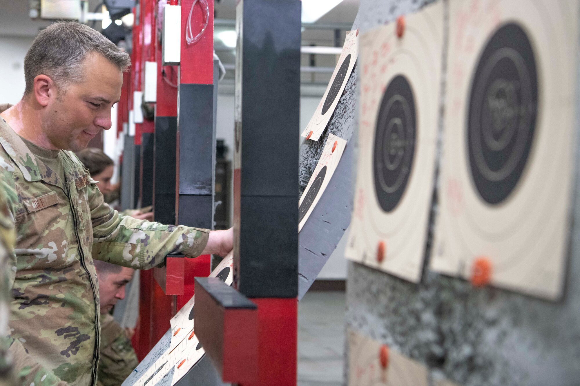 Tech. Sgt. Joseph Cole, 374th Security Forces Squadron flight sergeant, checks his target during the Excellence in Competition Sept. 15, 2022, at Yokota Air Base, Japan.