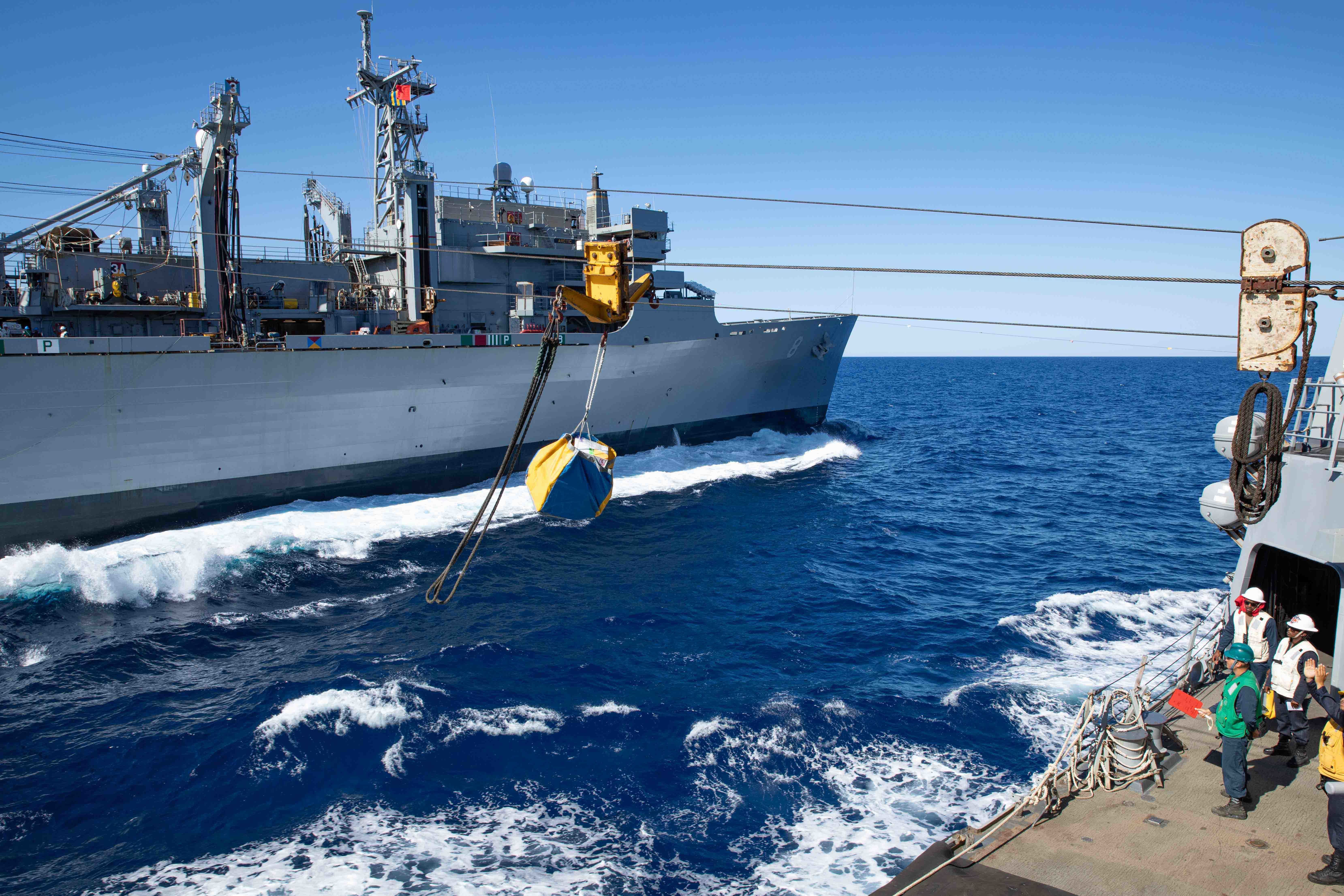 ADRIATIC SEA (Sept. 13, 2022) The Arleigh Burke-class guided-missile destroyer USS Truxtun (DDG 103) receives cargo from the fast combat support ship USNS Arctic (T-AOE 8) during a replenishment-at-sea, Sept. 13, 2022.