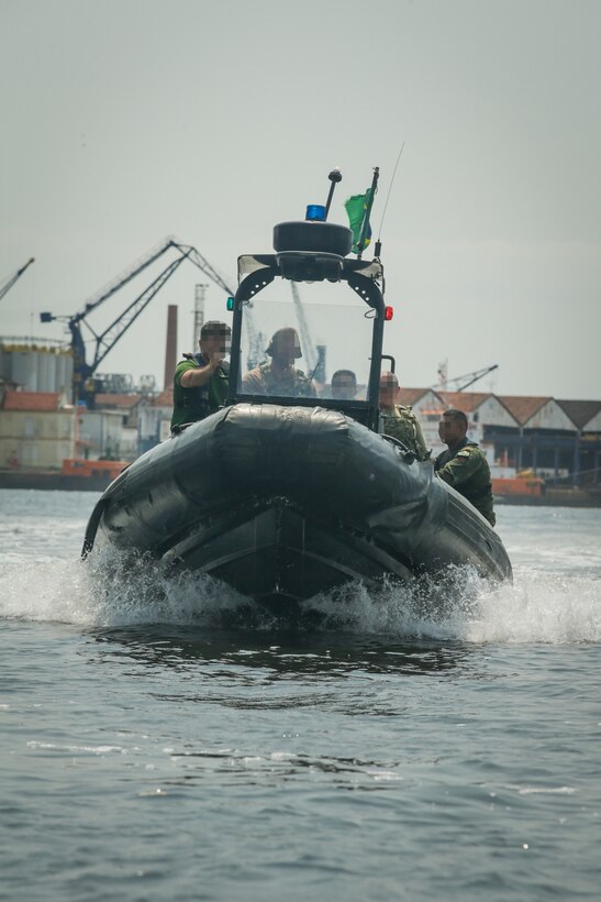 RIO DE JANIERO (Sept. 13, 2022) Members of Special Boat Team 22 train Brazilian counterparts on how to drive a vessel during a visit, board, search, and seizure (VBSS) as part of UNITAS LXIII, Sept. 13, 2022. UNITAS is the world’s longest-running maritime exercise.