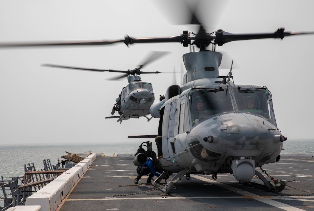 ATLANTIC OCEAN (Sept. 14, 2022) U.S. Marine helicopter pilots land two UH-1Y Venom on the flight deck of the amphibious transport dock ship USS Mesa Verde (LPD 19) during flight operations, Sept. 14, 2022.