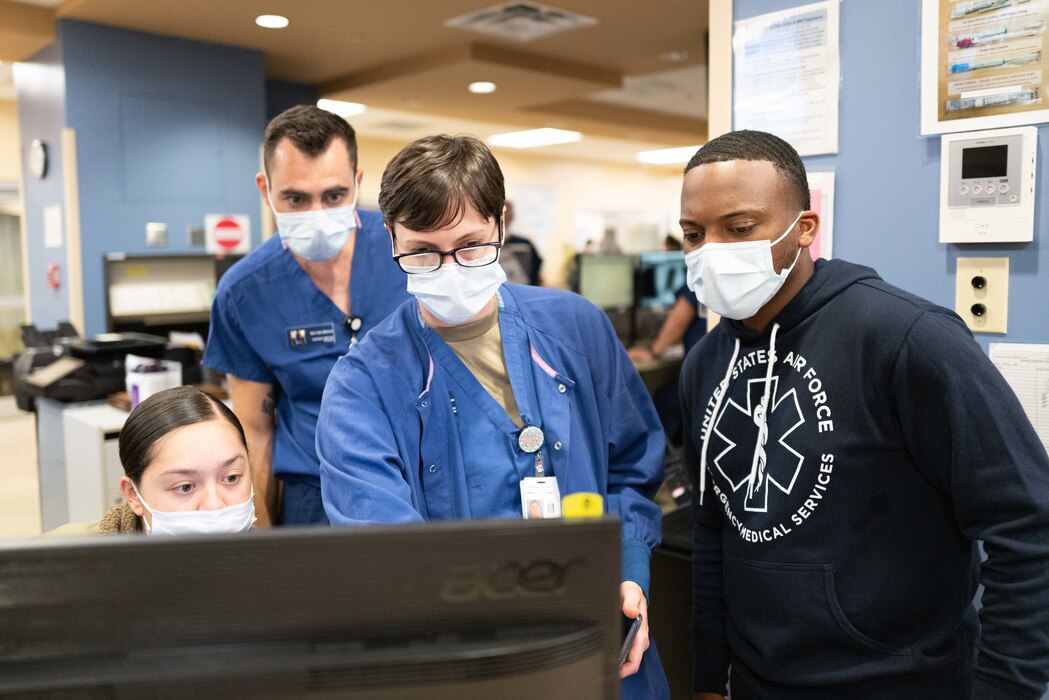 Airmen working at the emergency room