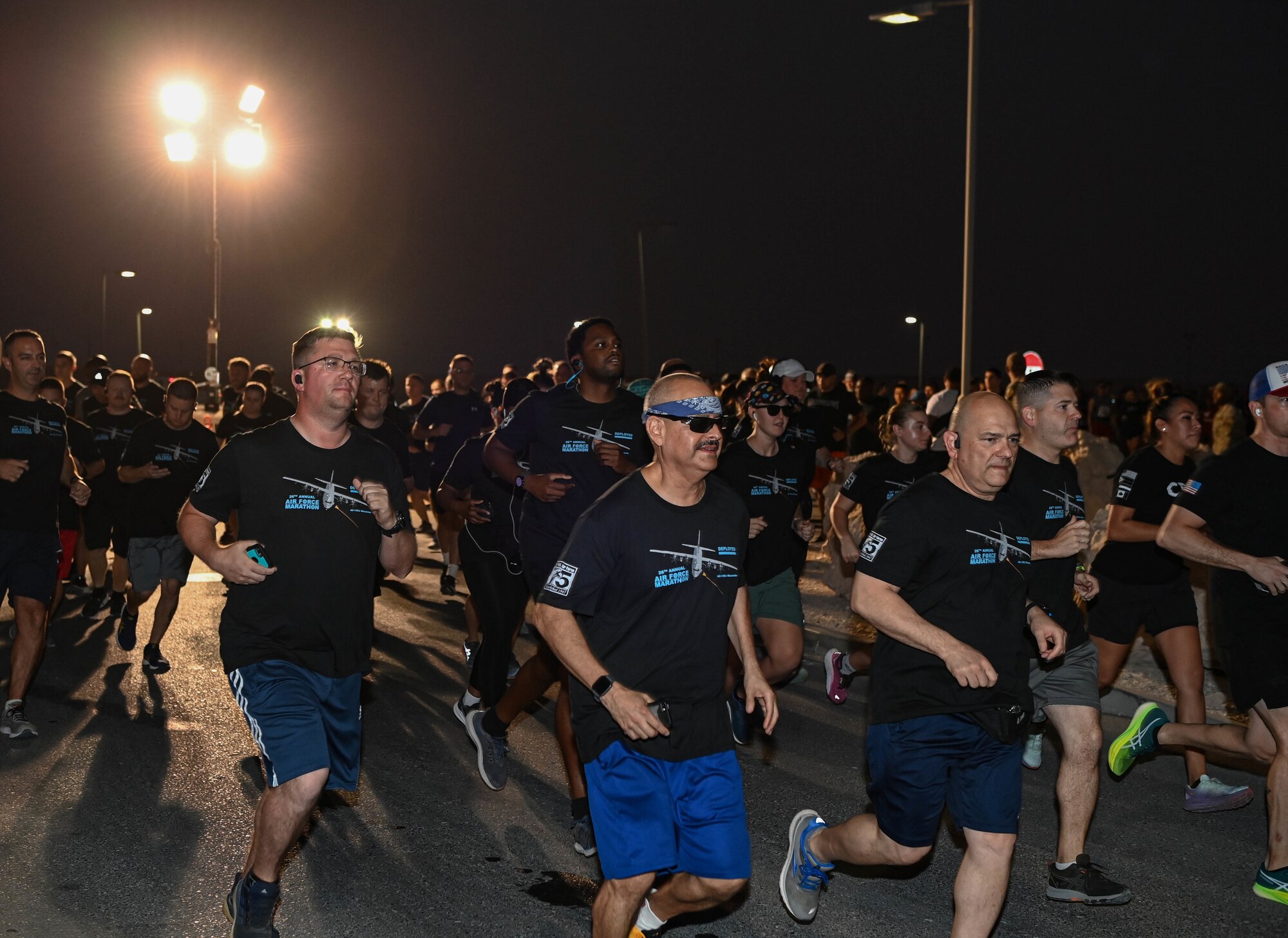 Members of Al Udeid Air Base, Qatar begin a run in celebration of the U.S. Air Force Birthday Sept. 17, 2022. The run commemorated the creation of the U.S. Air Force from the Army Air Corps 75 years ago. (U.S. Air National Guard photo by Master Sgt. Michael J. Kelly)