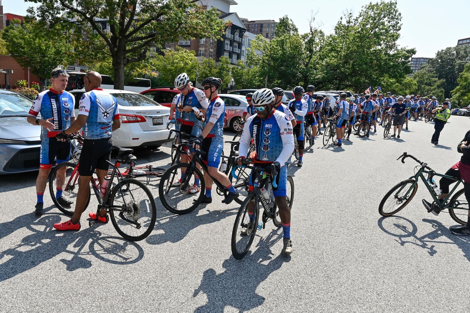 cyclists stage before getting into formation