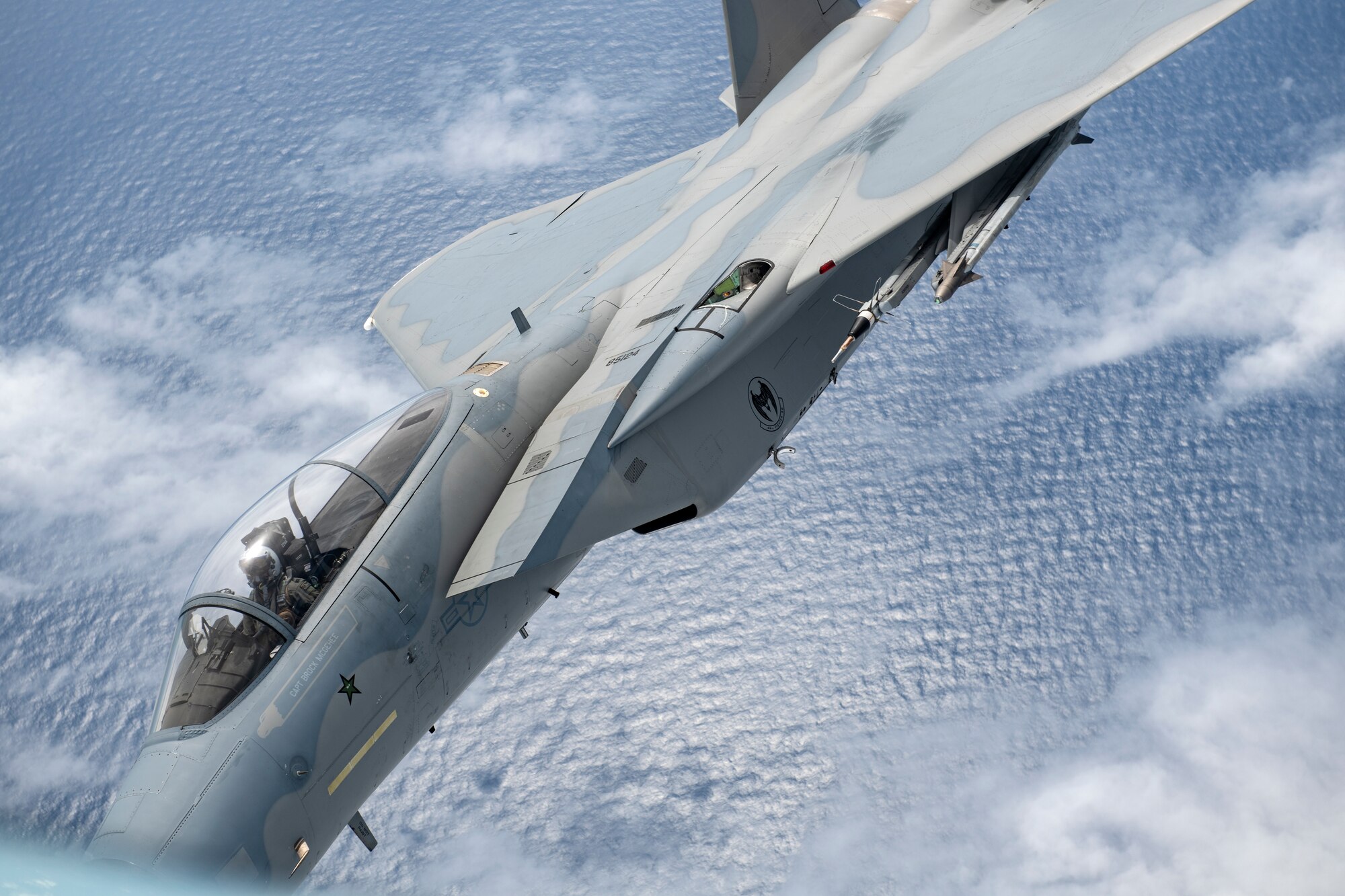 An F-15C Eagle assigned to the 44th Fighter Squadron departs after receiving aerial refueling while flying in support of Exercise Southern Beach over the Pacific Ocean, Sept. 15, 2022. Exercise Southern Beach is part of a continual effort to enhance interoperability between U.S. Forces and host nations, building a partnership that can effectively operate high-end missions in defense of a free and open Indo-Pacific region. (U.S. Air Force photo by Senior Airman Jessi Roth)