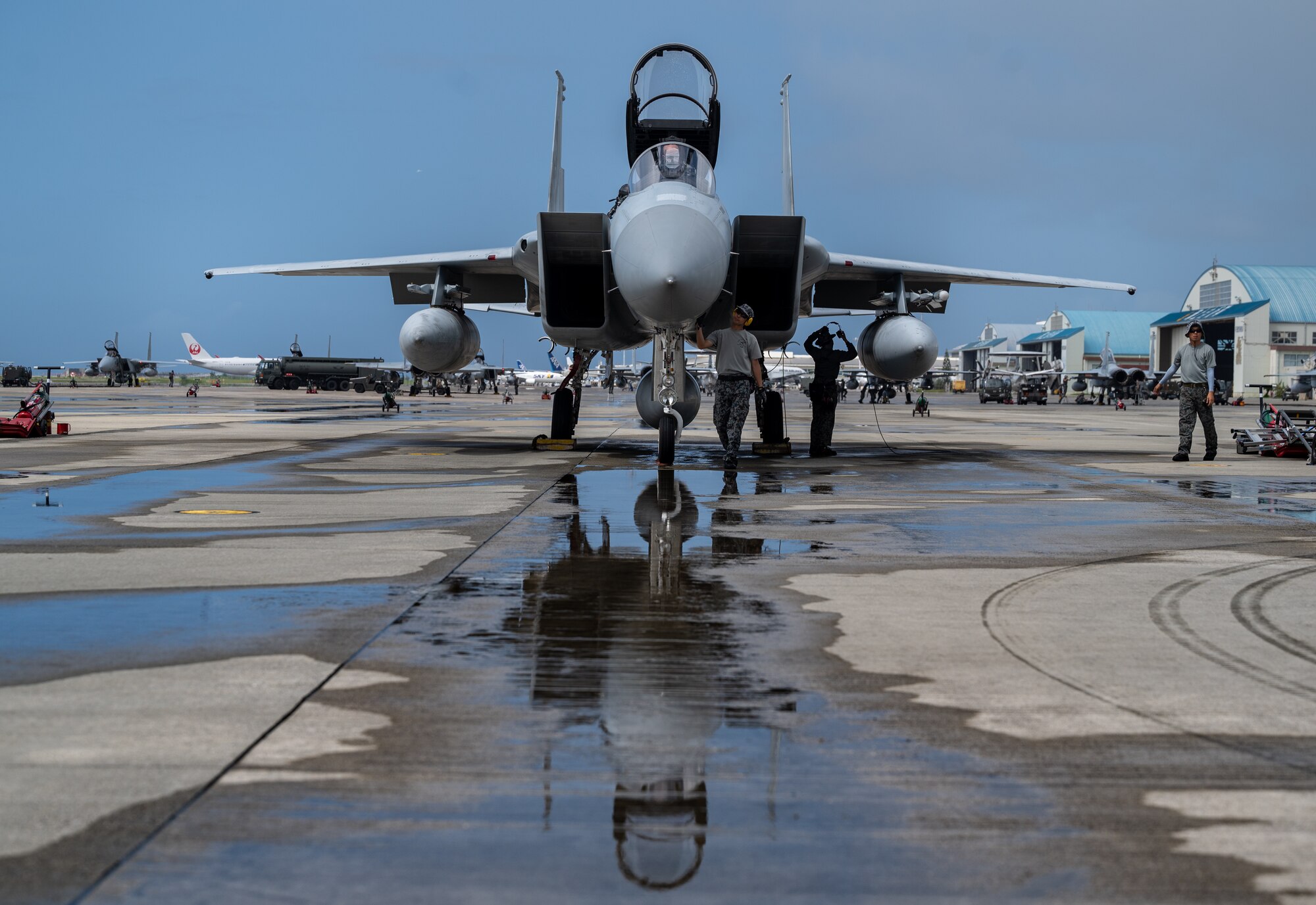 Japan Air Self-Defense Force personnel prep an F-15J for take off in support of Exercise Southern Beach at Naha Air Base, Japan, Sept. 16, 2022. Exercise Southern Beach is a locally organized bilateral training exercise that enhances interoperability by providing the opportunity for 18th Wing and JASDF units to practice mission planning, flying and debriefing together. (U.S. Air Force photo by Senior Airman Stephen Pulter)