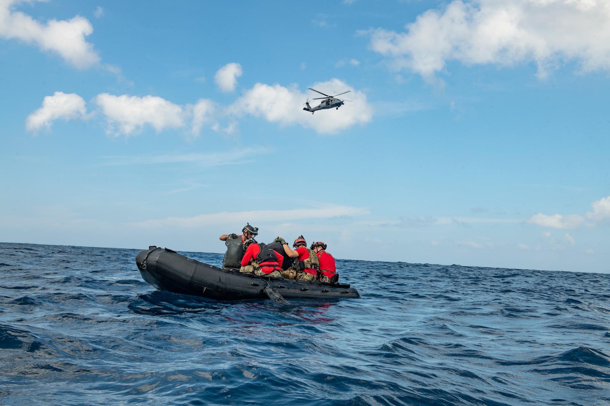 U.S. Air Force pararescuemen assigned to the 31st Rescue Squadron are aboard a combat rubber raiding craft during a search and rescue training exercise in the Pacific Ocean, Sept. 13, 2022. These training exercises are designed to posture RQS’s to respond quickly and effectively to a wide range of possible contingencies. (U.S. Air Force photo by Senior Airman Jessi Roth)