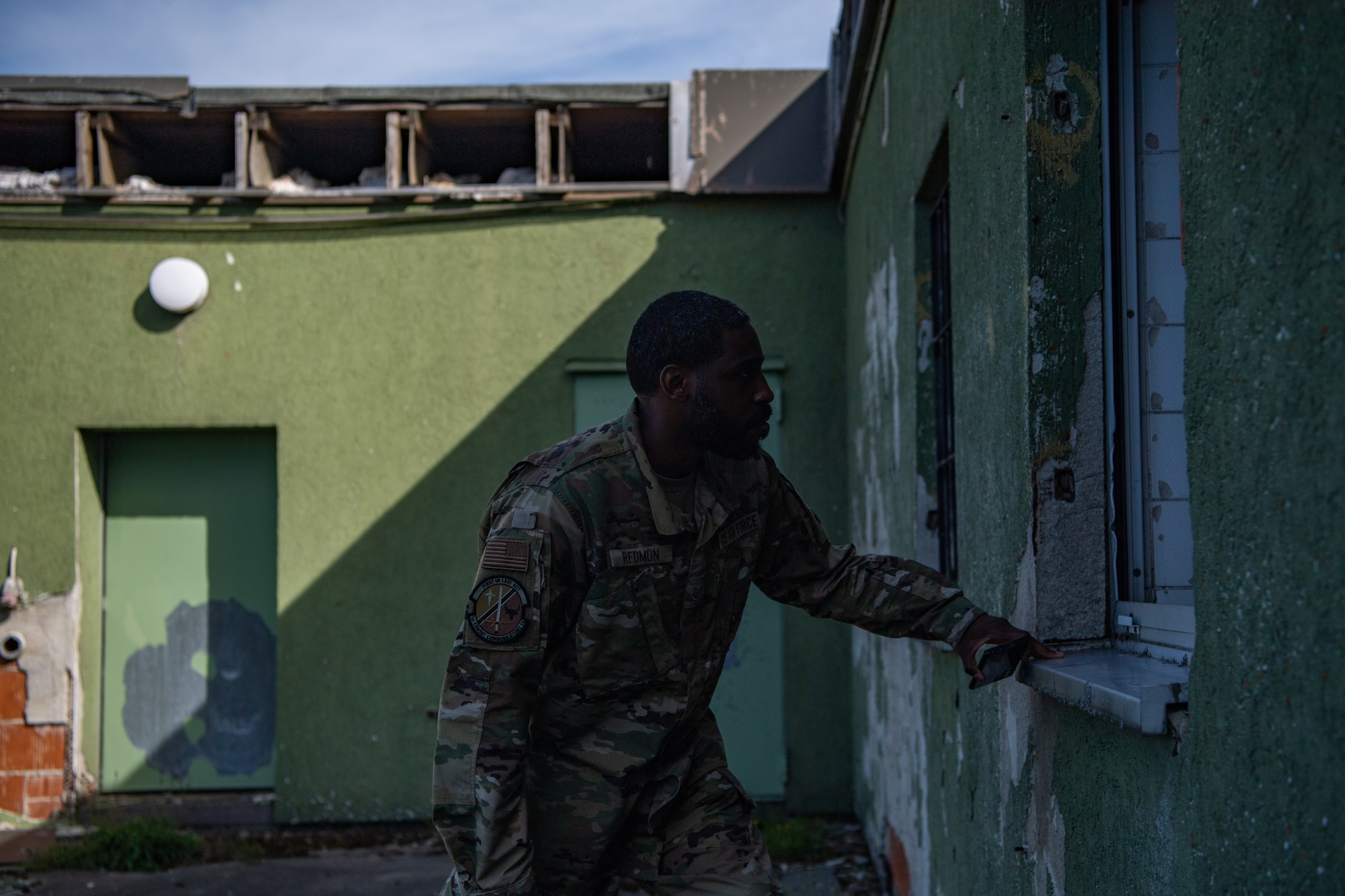 U.S. Air Force Tech. Sgt. Albert Redmon, 1st Combat Communications Squadron  flexible communications noncommissioned officer in charge, conducts a site survey