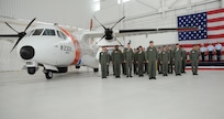 U.S. Coast Guard pilots from the Aviation Training Center Mobile, Ala., participate in an official change of the watch ceremony where the HC-144A Ocean Sentry relieved the HU-25 Guardian, Friday Sept. 25, 2009.