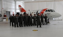 U.S. Coast Guard pilots from the Aviation Training Center Mobile, Ala., participate in an official change of the watch ceremony where the HC-144A Ocean Sentry relieved the HU-25 Guardian, Friday Sept. 25, 2009.