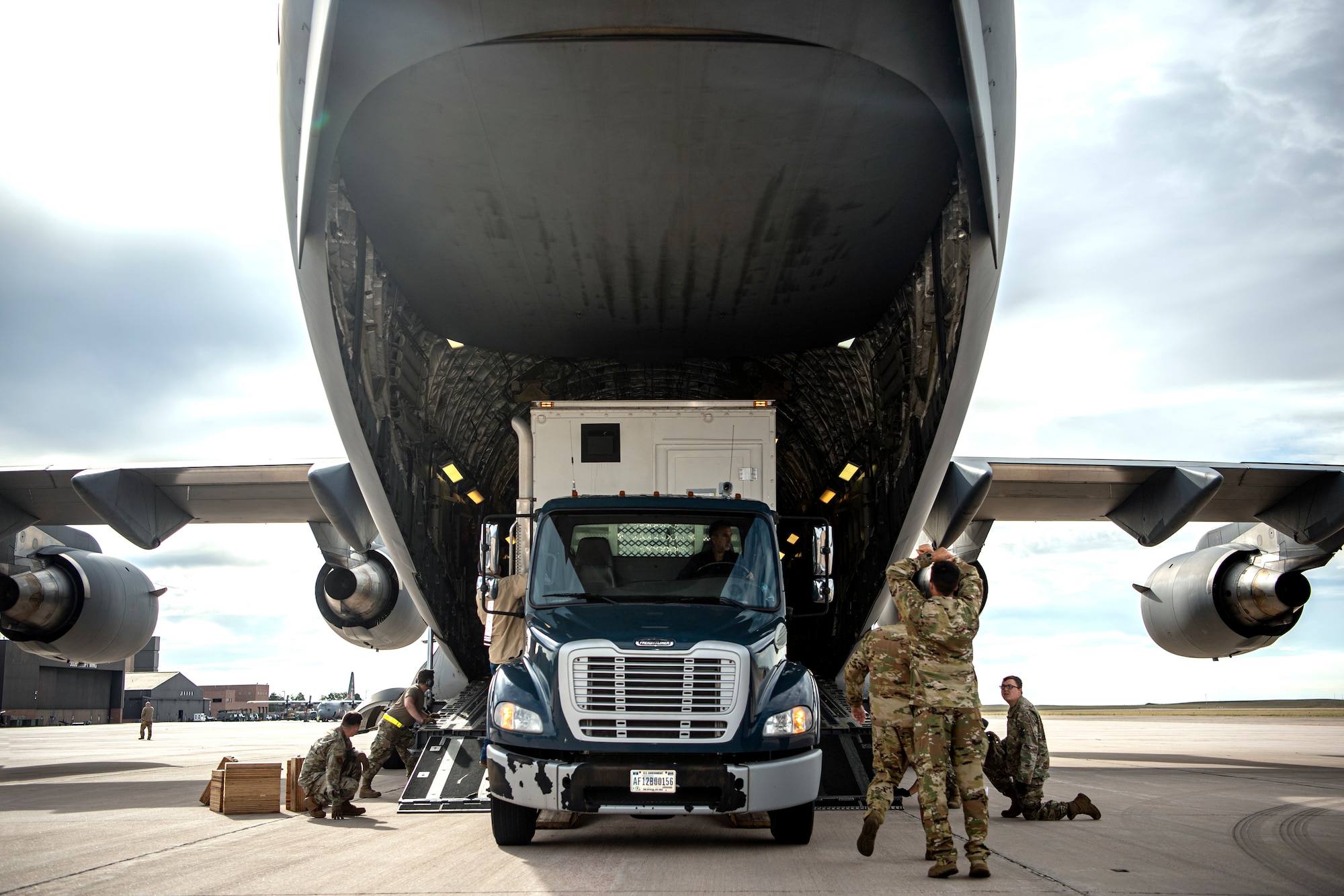People loading equipment.