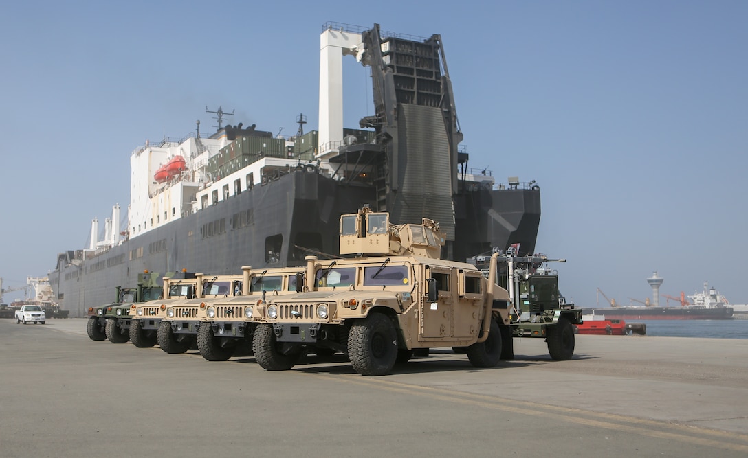 U.S. Marines with Combat Logistics Regiment 1, 1st Marine Logistics Group, stage vehicles in preparation for ship on-load during exercise Native Fury 22 at Yanbu Commercial Port, Kingdom of Saudi Arabia, Aug. 24, 2022. The Kingdom of Saudi Arabia enables the U.S. Marine Corps Central Command and U.S. Central Command to receive and employ forces and resources rapidly in the region through a growing network of western geographic access and staging points.