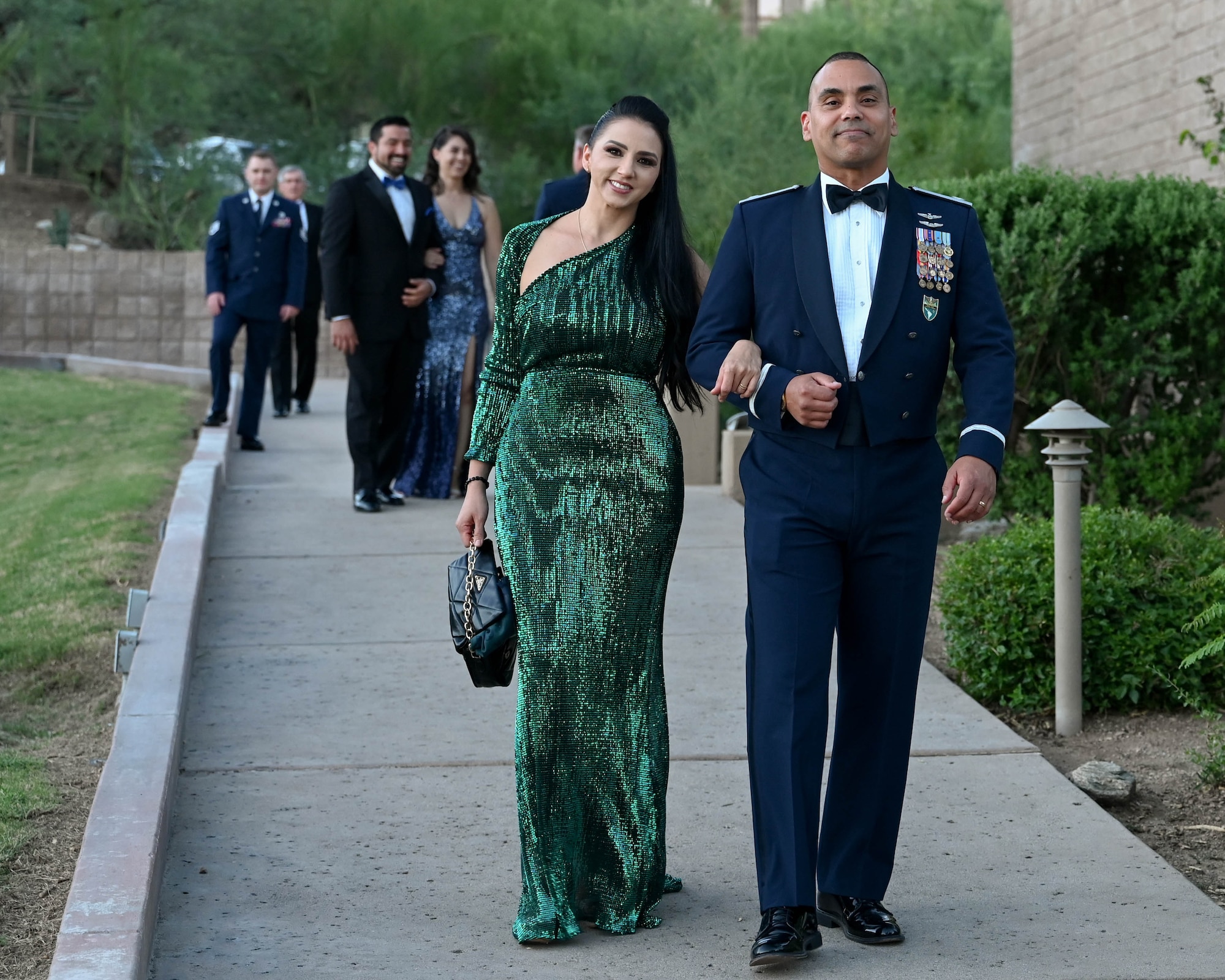 A photo of a couple walking.