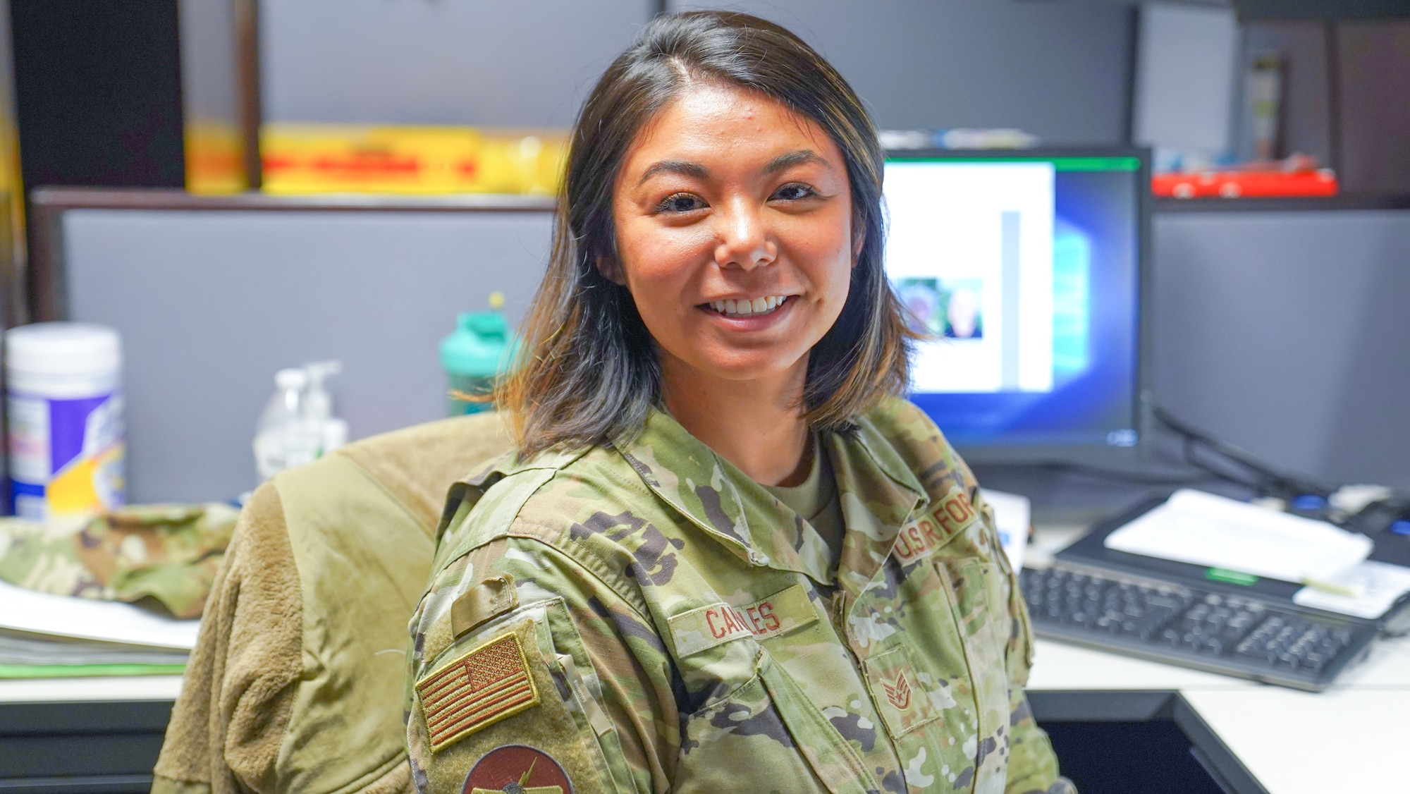U.S. Air Force Staff Sgt. Lizzully Canales-Acuna, 335th Training Squadron instructor, poses for a photo at Keesler Air Force Base, Aug. 30, 2022. Canales-Acuna shared her story in recognition of National Hispanic Heritage Month, celebrated September 15 to October 15. (U.S. Air Force photo by Airman 1st Class Elizabeth Davis)
