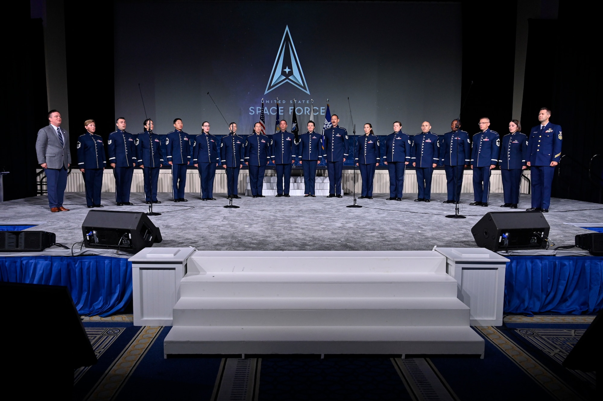 Air Force Band members and guests sing the new U.S. Space Force service song during the 2022 Air, Space and Cyber Conference in National Harbor, Md., Sept. 20, 2022.