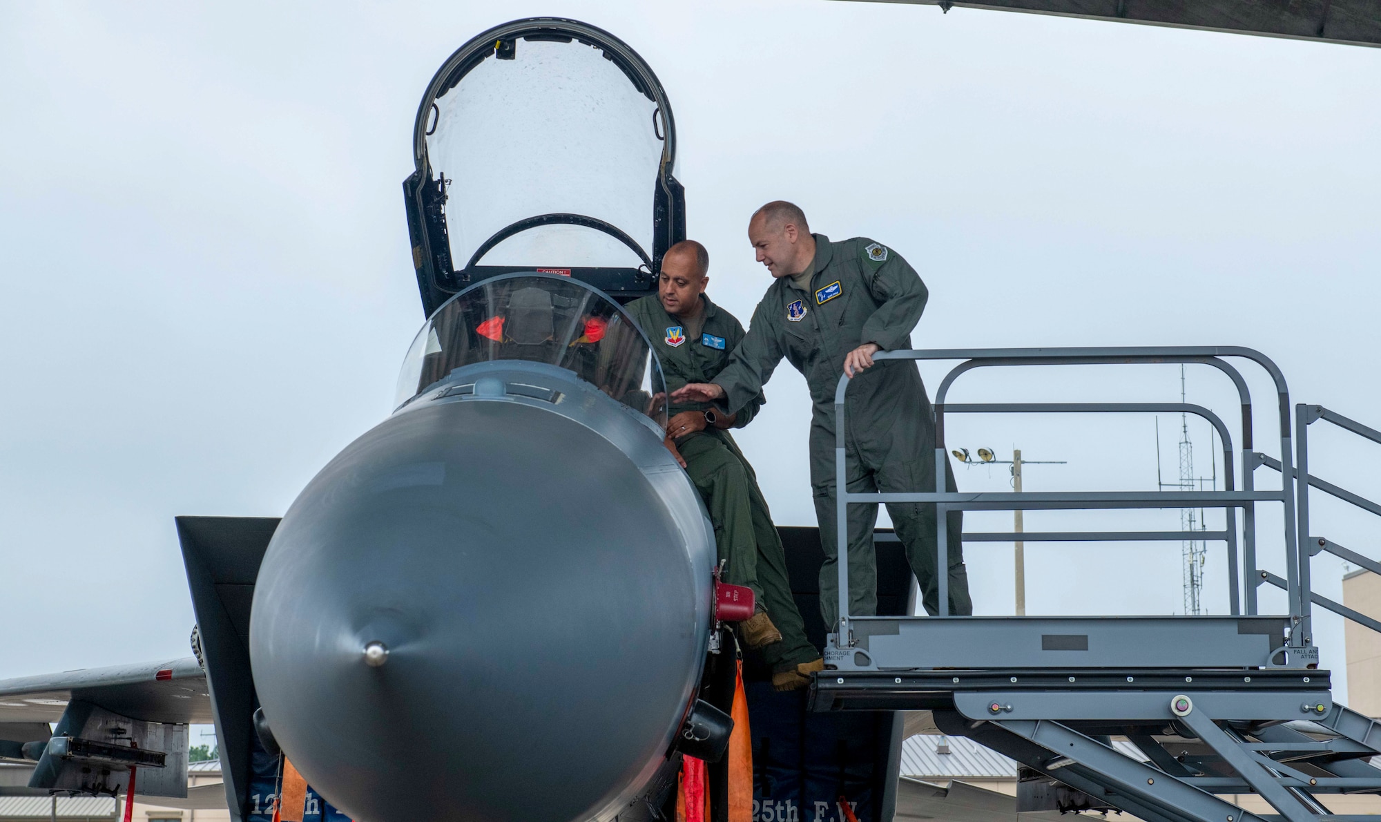 U.S. Air Force Col. Mansour Elhihi, left, commander, 125th Operations Group, 125th Fighter Wing, Florida National Guard, highlights components of the F-15C Eagle aircraft to Maj. Gen. Duke Pirak, deputy director, Air National Guard, during a unit visit to the Jacksonville Air National Guard Base, FL, Sept. 13, 2022. During his visit, Pirak received a mission brief and update on the long-awaited F-35A Lightning II conversion. (U.S. Air National Guard photo by Tech. Sgt. Chelsea Smith)