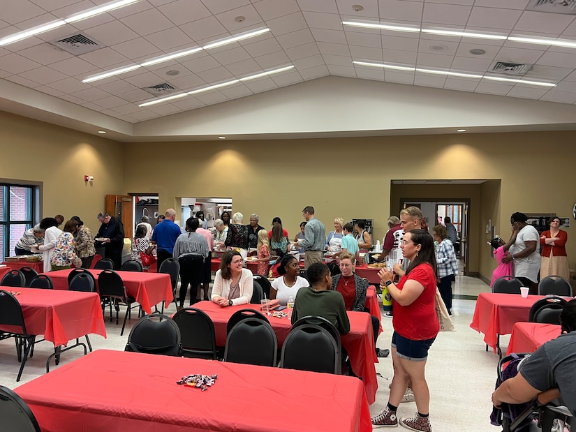 Personnel mingle at a Chapel event.