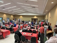 Personnel mingle at a Chapel event.