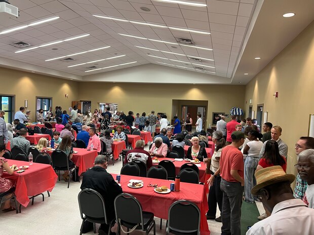 Personnel mingle at a Chapel event.