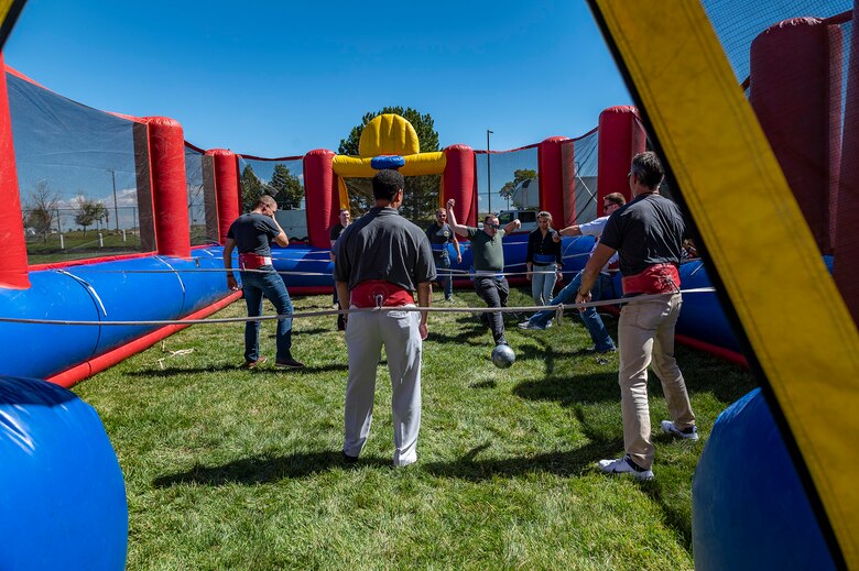 Team Buckley members play human foosball during the