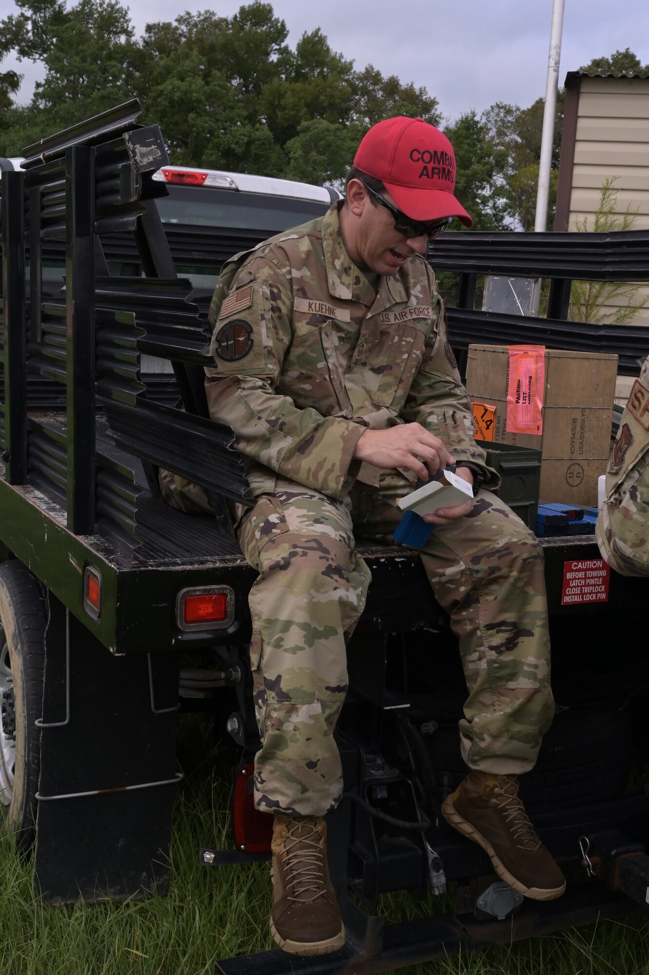 a man prepares simulation rounds for a training exercise