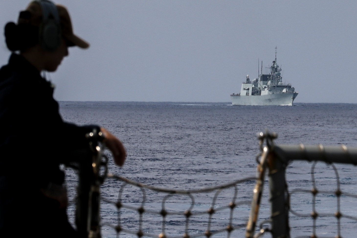 SOUTH CHINA SEA (Sept. 19, 2022) The Royal Canadian Navy Halifax-class frigate HMCS Vancouver (FFH 331) cruises behind U.S. Navy Arleigh Burke-class guided-missile destroyer USS Higgins (DDG 76) while conducting integrated operations in the South China Sea, Sept. 19. Higgins is assigned to Commander, Task Force 71/Destroyer Squadron (DESRON) 15, the Navy’s largest forward-deployed DESRON and the U.S. 7th Fleet’s principal surface force. (U.S. Navy photo by Mass Communication Specialist 1st Class Donavan K. Patubo)