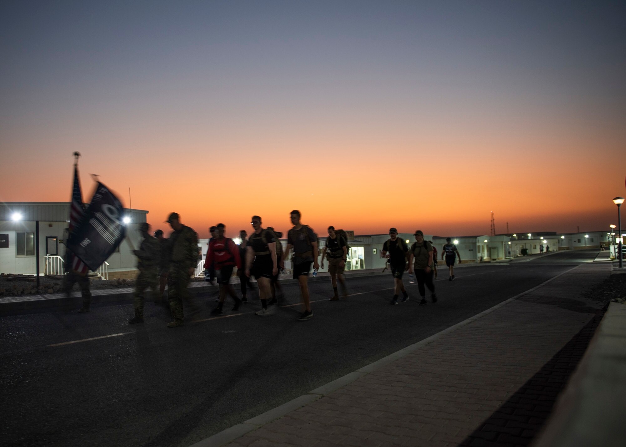 Members from the 386 Air Expeditionary Wing marched throughout the evening at Ali Al Salem Air Base, Kuwaiti, 11 Sept. 2022 in remembrance of those lost on Sept. 11, 2001. Members from multiple branches of service and coalition teammates from throughout the world took part in the 24-hour march. (U.S. Air Force photo by Senior Master Sgt. David Salanitri)