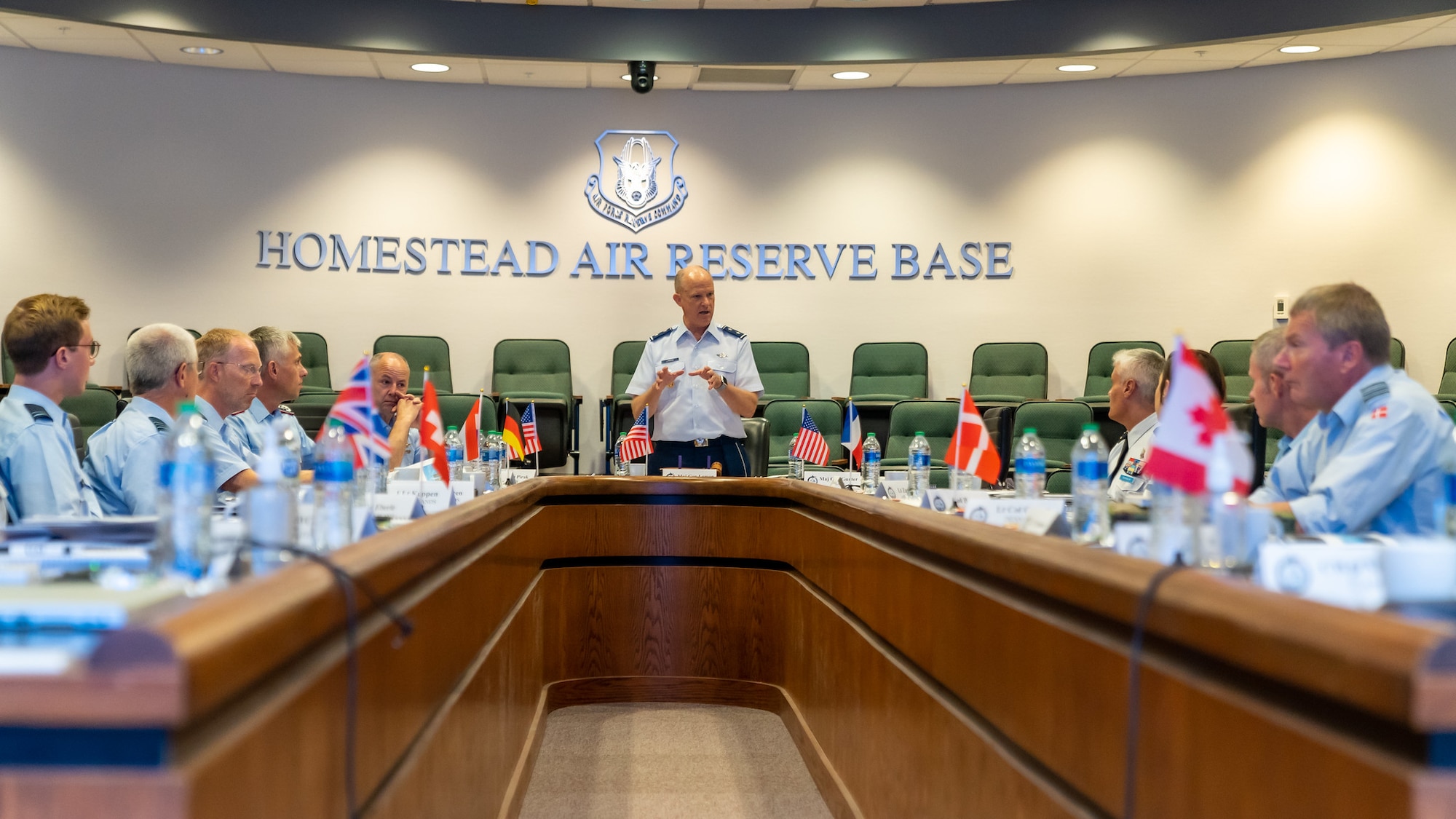 Maj. Gen. Bret Larson, 22nd Air Force Commander, briefs the 26th annual International Air Reserve Symposium representatives, September 14, 2022 at Homestead Air Reserve Base, Florida.
