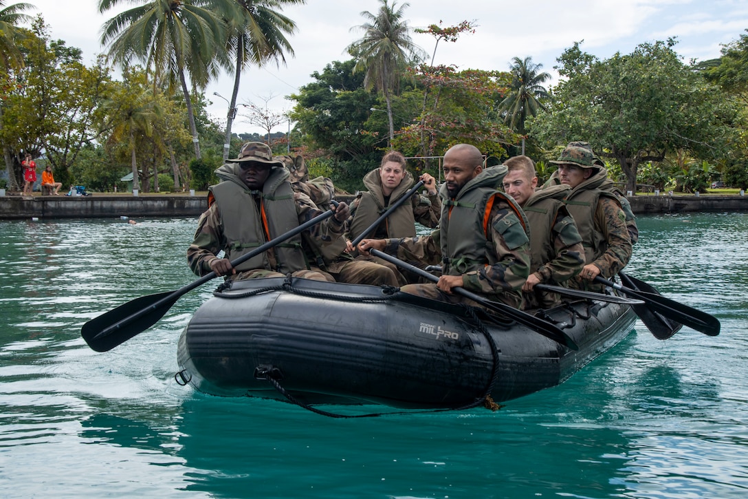 U.S. Marines with Headquarters and Service and Battalion, U.S. Marine Corps Forces, Pacific, and members of the Marine Infantry Regiment in French Polynesia, French Armed Forces, paddle a combat rubber raiding craft during the Aito Course in Taravao, Tahiti, French Polynesia, Sept. 5, 2022. The event provided a bilateral training opportunity between the French Armed Forces and Marines with U.S. Marine Corps Forces, Pacific. The nine Marines and Sailor from HQSVCBN participated in the bilateral training with the French Armed Forces in order to strengthen relationships with the region. The course’s name comes from the Tahitian word “aito,” which means warrior.