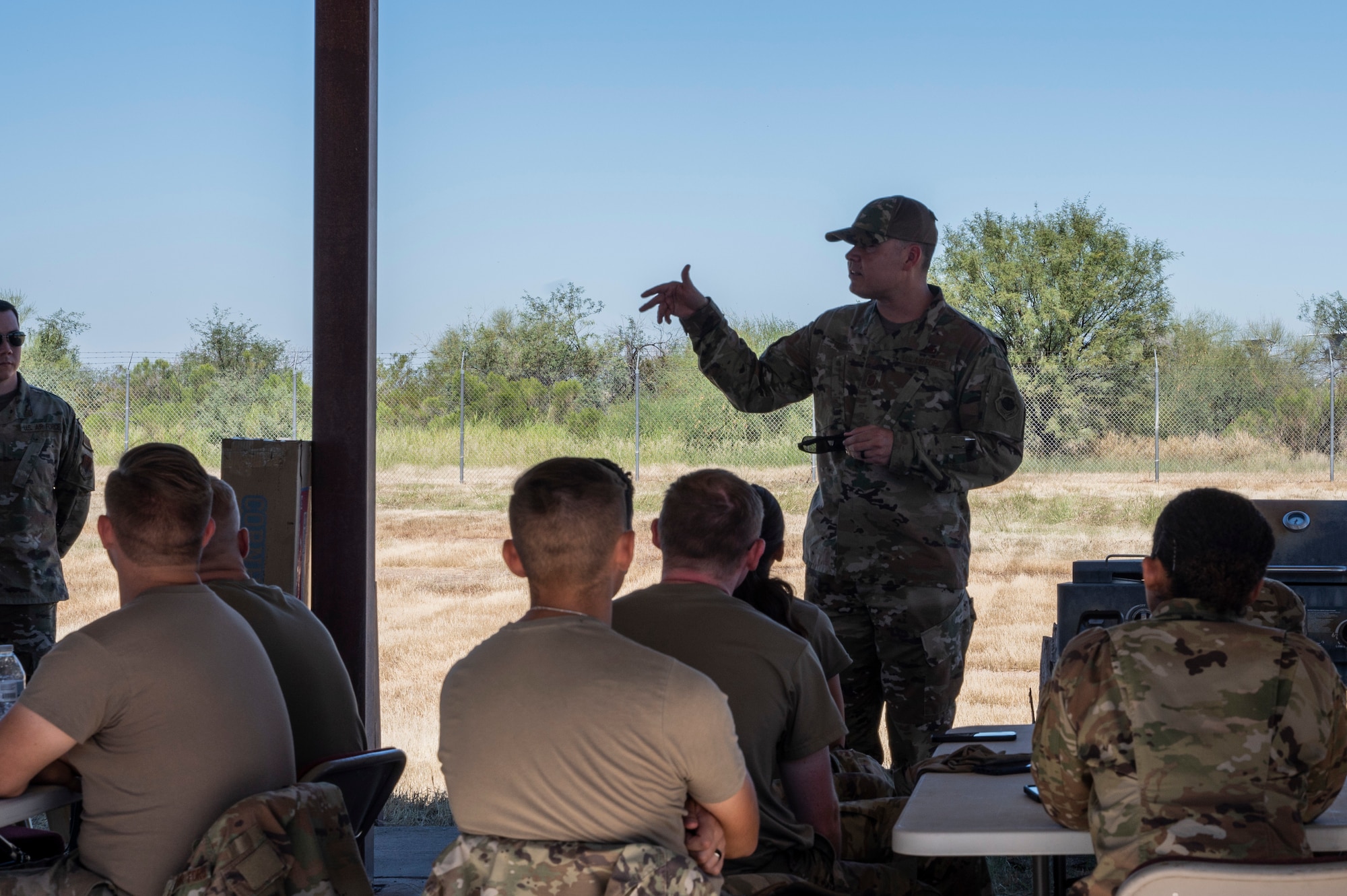 A photo of Airmen talking