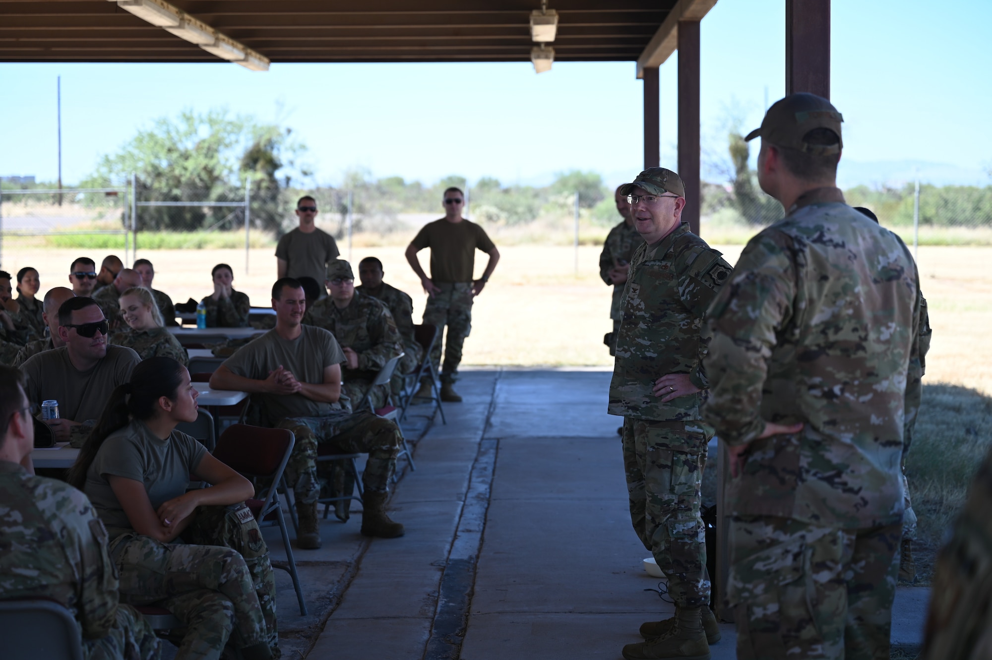 A photo of Airmen talking