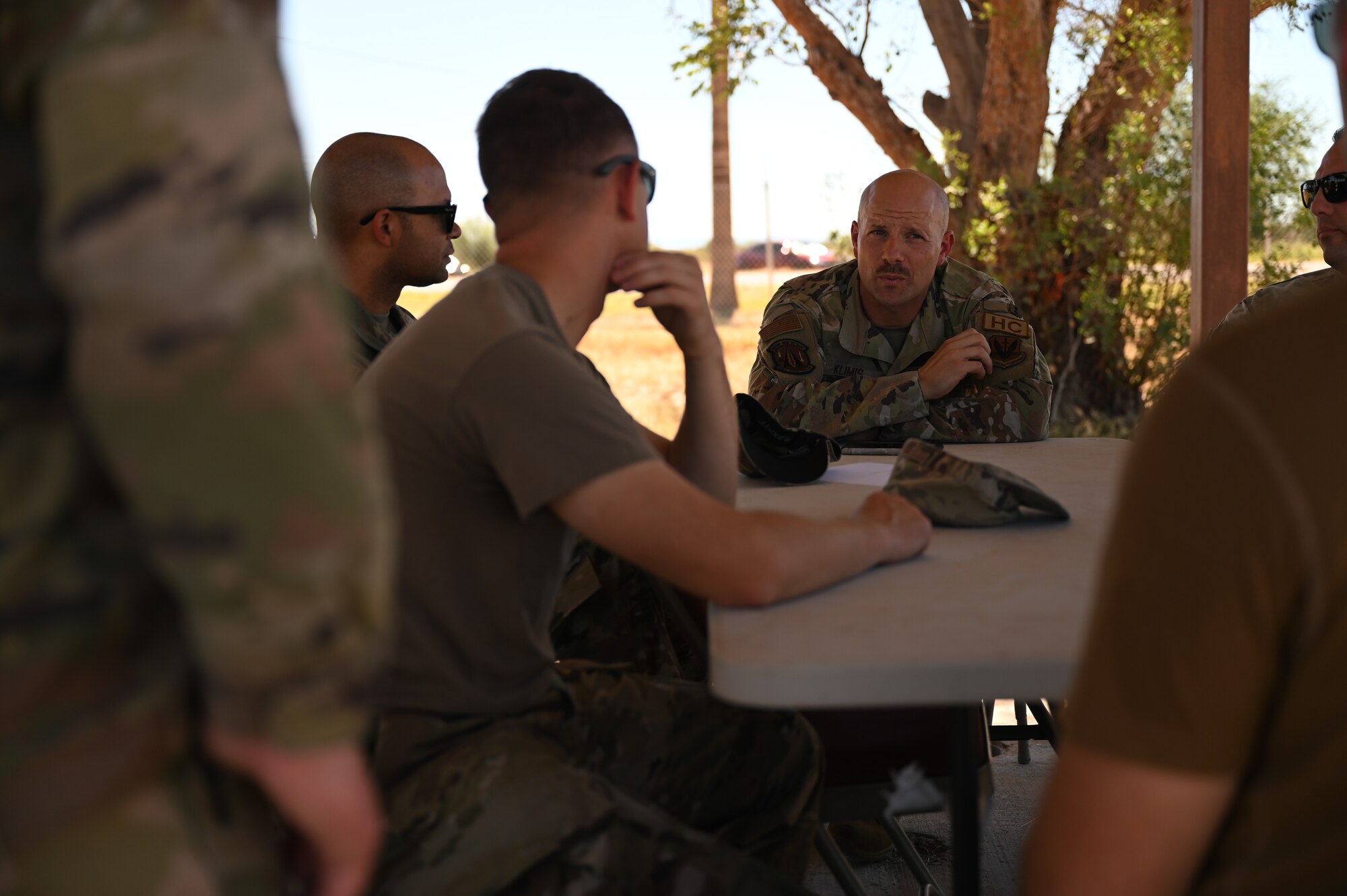 A photo of Airmen talking